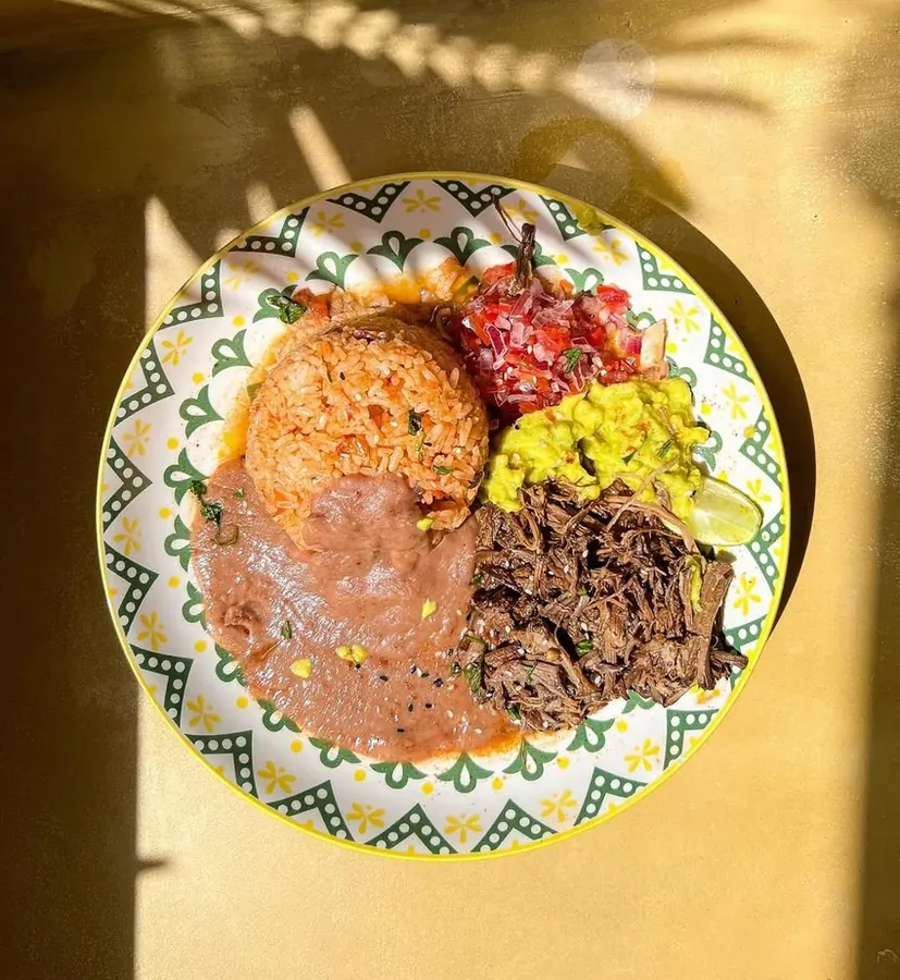 Chilli con carne, Rosa's deconstructed version, with Mexican rice, refried beans, pico and guacamole